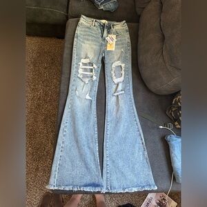 Light Wash Distressed Boot Cut Jeans - Women's